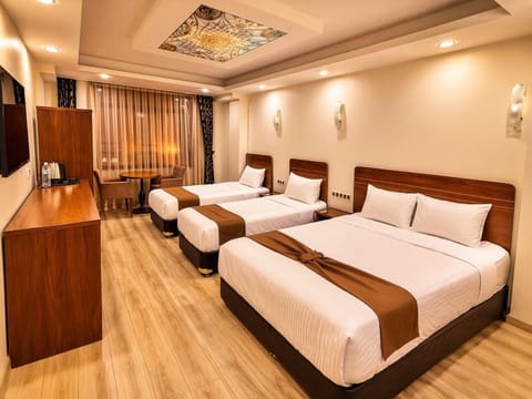 Family Quadruple Room, City View | WiFi (free), bed sheets
