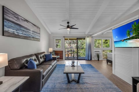 Bright island-inspired living area with seamless indoor-outdoor flow.