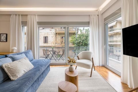 Comfort Apartment, Balcony, City View | Living area | 55-inch Smart TV with digital channels
