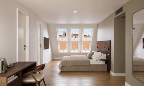 Deluxe Double Room, City View | Desk, laptop workspace, blackout drapes, soundproofing