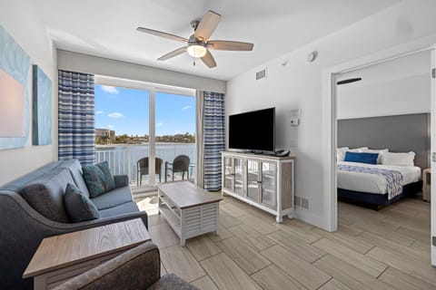 Unwind in comfort with ample seating and vibrant décor, just steps from the marina views.