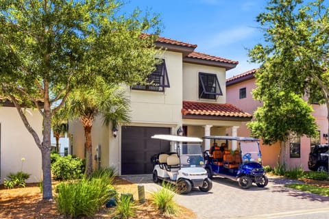 Two Golf Carts and Private Driveway
