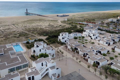 Aerial view of a listed Historic Monument set across 5 hectares — with the Mediterranean beach right on the doorstep.
