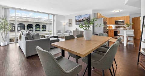 Spacious living and dining layout with city views and contemporary finishes ideal for comfortable extended stays.