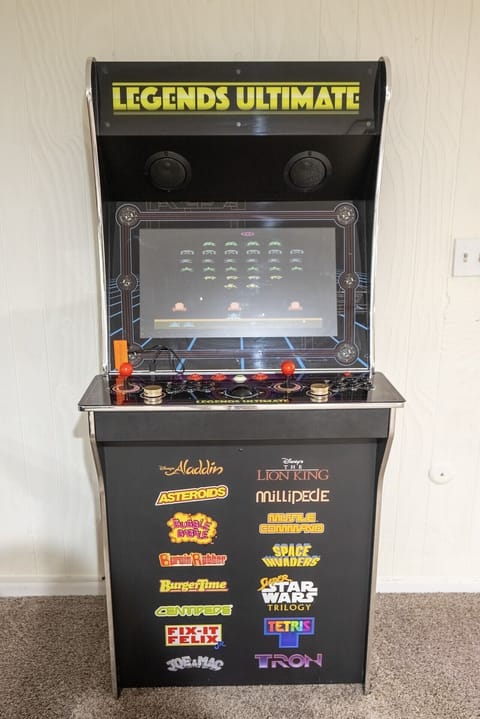 Bring the classic arcade experience home! This full-size AtGames Legends Ultimate arcade cabinet is in great working order and excellent cosmetic condition. Features a large, crisp screen, dual joysticks, trackball, and spinner controls perfect for multip