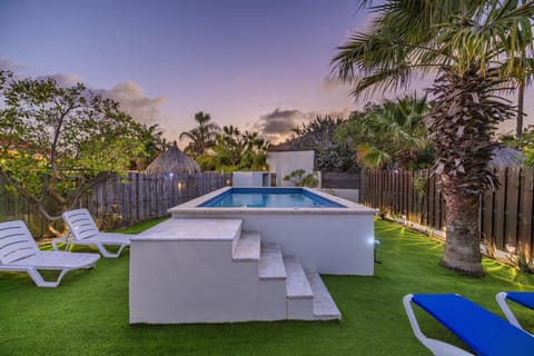 Escape to your own private pool oasis surrounded by tropical charm and warm Aruba sunshine.
