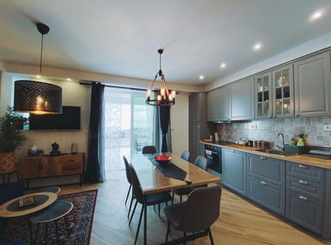 Apartment (Three Bedroom Apartment with Balcony) | Private kitchen | Fridge
