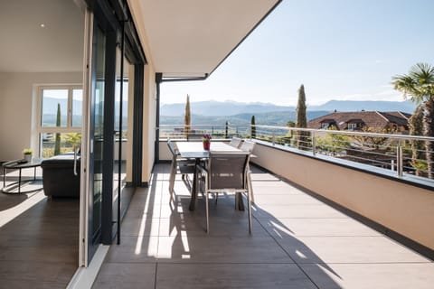 A large terrace with a mountain view