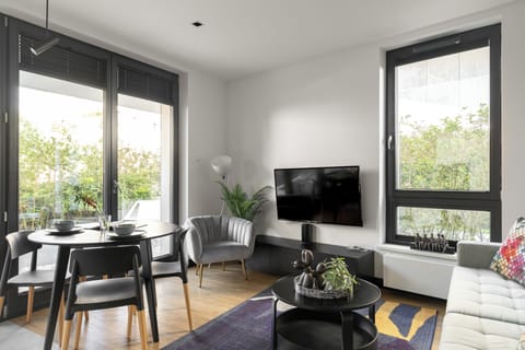 Deluxe Apartment, Kitchenette, Courtyard View | Living area | 40-inch flat-screen TV with cable channels