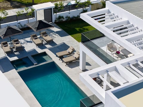 The private 60m2 pool invites sunlit relaxation, with soothing hydromassage feat