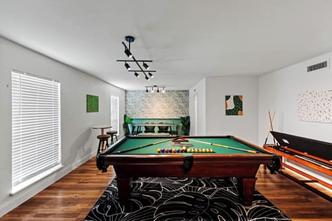 Full-size pool table ready for hours of entertainment—fun for guests of all ages.