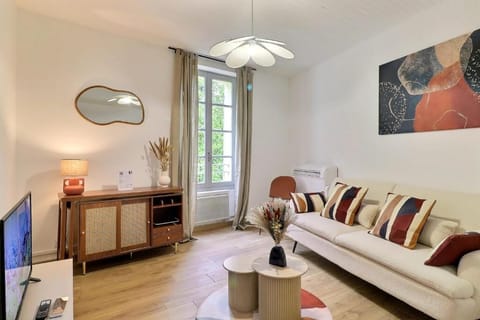 Classic Apartment, City View | Living area | 110-cm Smart TV with digital channels