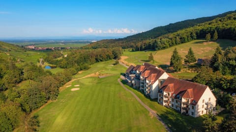 The 18-hole Trois-Epis golf course stretches right to the doorstep of Résidence Le Domaine du Golf.