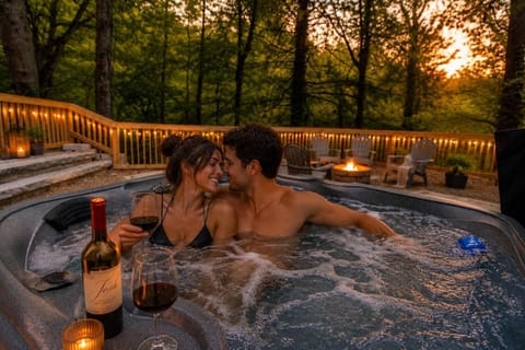 Relax in the private hot tub surrounded by peaceful woodland views—an ideal spot to unwind after hiking, exploring Gatlinburg, or enjoying a day in the Smokies.
