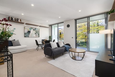 Stretch out and relax in the comfortable lounge while enjoying the bright, airy feel of this beautifully styled apartment.