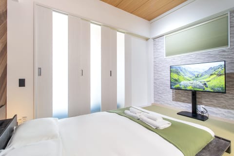 Apartment, 2 Double Beds, Non Smoking, Balcony | Desk, laptop workspace, blackout drapes, soundproofing