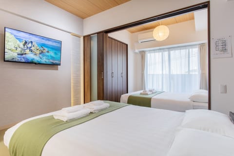 Apartment, 2 Double Beds, Non Smoking, Balcony | Desk, laptop workspace, blackout drapes, soundproofing