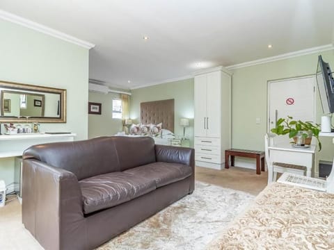 Luxury Double Room, Patio | Living area | TV