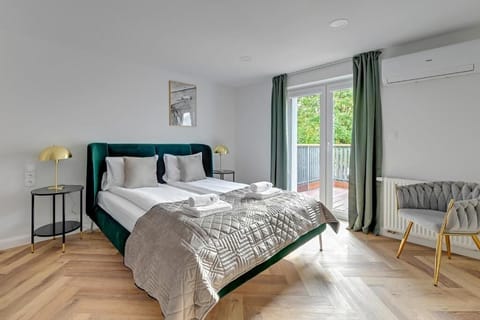 Family Apartment, Balcony | Individually decorated, individually furnished, iron/ironing board