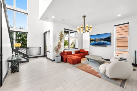 As soon as you enter the home, you are greeted by a designer living room area.