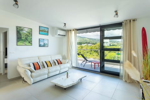 Comfort Apartment, Balcony, Mountain View | Living area | 130-cm LED TV with cable channels