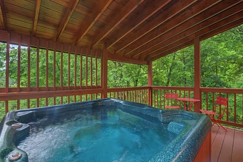 Soak away your cares in your private covered hot tub, surrounded by lush forest views and the peaceful sounds of nature.