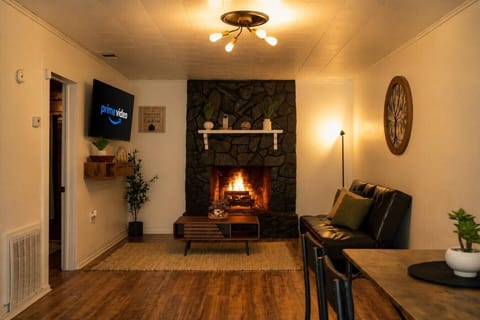 Cozy up by the fireplace and enjoy warm, relaxing evenings at home.