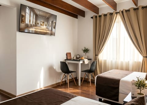 Comfort Twin Room | Down comforters, minibar, in-room safe, desk