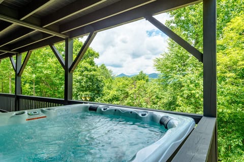 Private covered hot tub with peaceful forest and mountain views