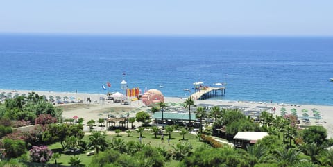 On the beach, sun loungers, beach umbrellas, beach bar