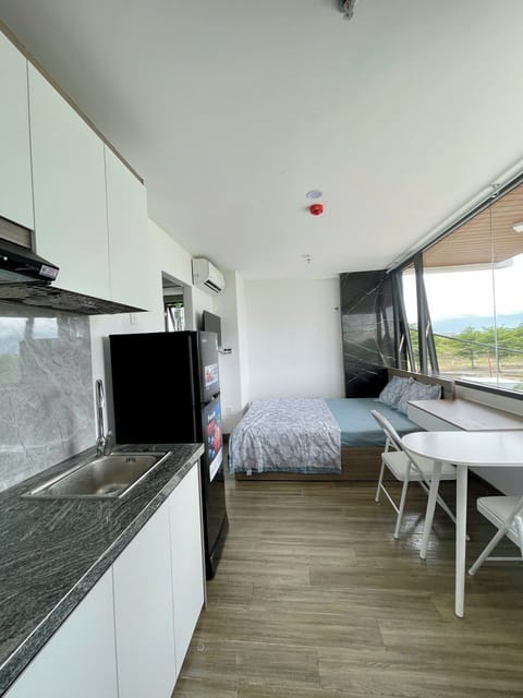 Classic Studio, 1 Large Twin Bed, Kitchen, Mountain View | Desk, blackout drapes, iron/ironing board, WiFi (free)