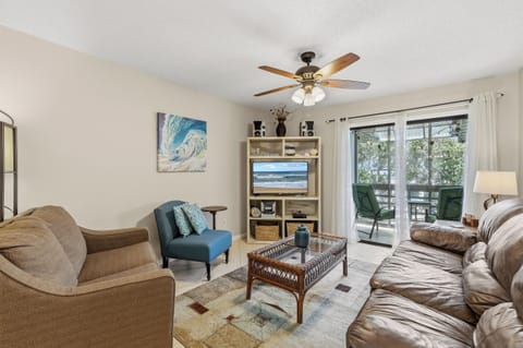 After a perfect beach day, settle into the cozy coastal comfort of Sea Woods 248.