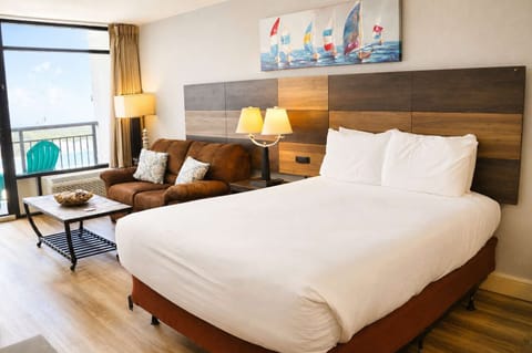 Wake up refreshed in a serene Queen bedroom featuring premium linens, soft natural light, and plenty of space to unwind.