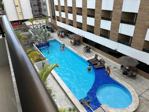 Family Studio, Multiple Beds, Refrigerator & Microwave, Pool View | Pool | 2 outdoor pools