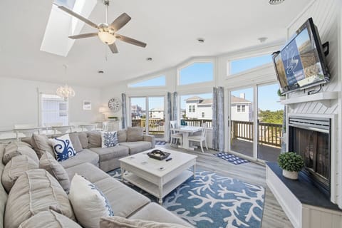 Top-Level Living Room with Deck Access