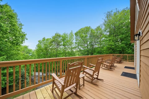 Row after row of rocking chairs, a canopy of summer green, and all the Blue Ridge air you can breathe.