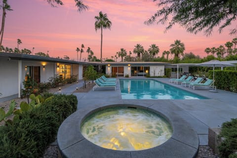 A luxury 4 bedroom and 4.5 bathroom home with a private pool, spa, outdoor dining, and chef's kitchen located in Indio, CA.