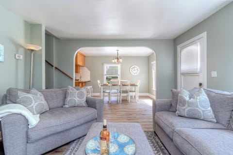 Open-concept layout keeps the living room, dining area, and kitchen connected.