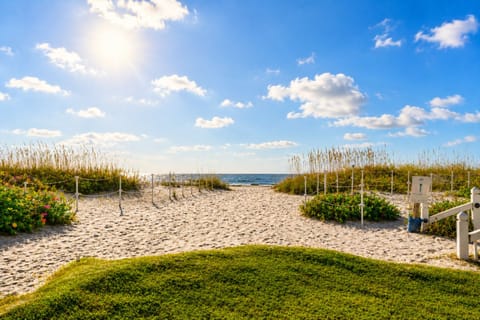 Just steps from your door—pristine sands and the rolling waves of the Isle of Palms beach.