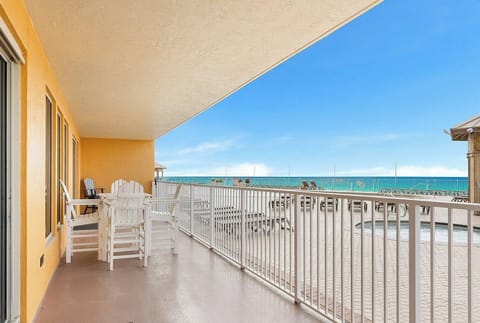 Private balcony with a gate to the pool deck