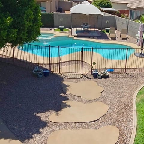 Large backyard with gated heated pool & spa!