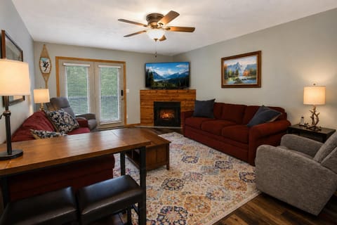 Welcome to Creekside J38, a charming end-unit townhome with a cozy electric fireplace and ample space for your entire group to relax and unwind.