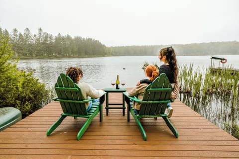 Private lakefront dock at Inkwood Reserve — relax in Adirondack chairs on your private dock overlooking a serene Catskills lake, just a 5-minute walk from the cabin. Perfect for morning coffee, sunset wine, or simply enjoying the landscape.