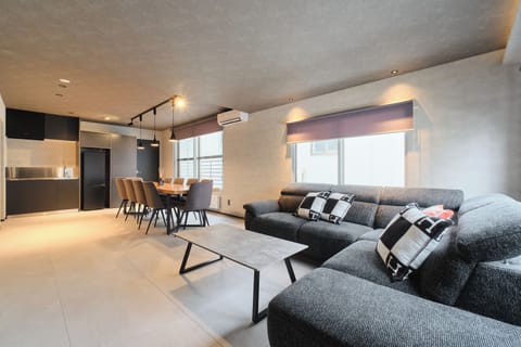 Comfort Villa | Living area | 65-inch flat-screen TV with cable channels, Netflix, streaming services