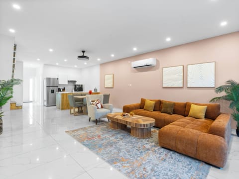 Open-concept main level. Housing the living, dining and kitchen area