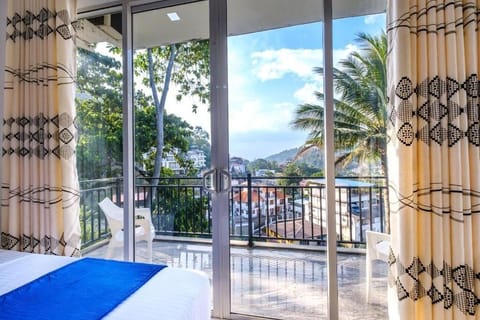 Deluxe Double Room, Balcony, Mountain View | Laptop workspace, soundproofing