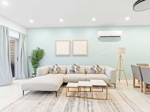 Stretch out, unwind, and enjoy the calm modern feel of this open living area.