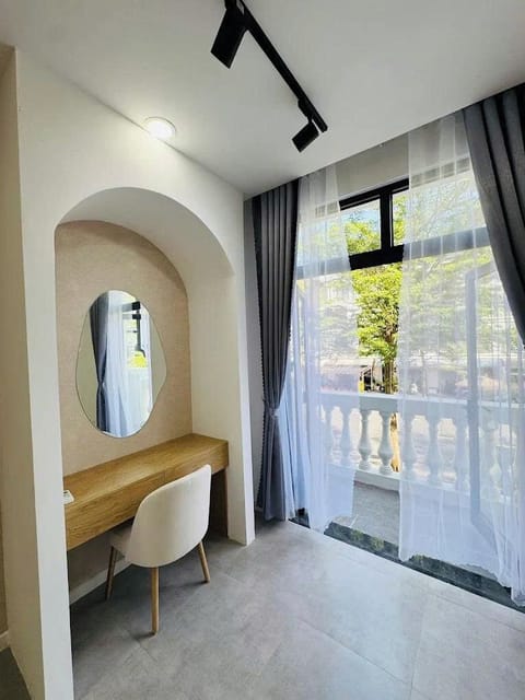 Deluxe Quadruple Room, Balcony, City View | Desk, laptop workspace, soundproofing, free WiFi