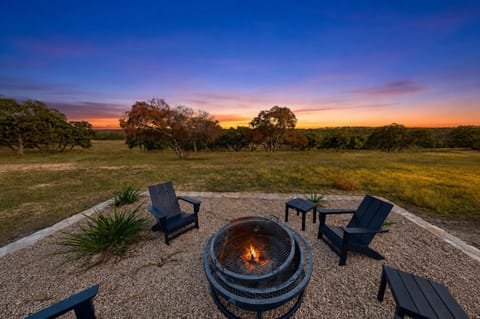Sunset, a fire and miles of Texas Hill Country views.