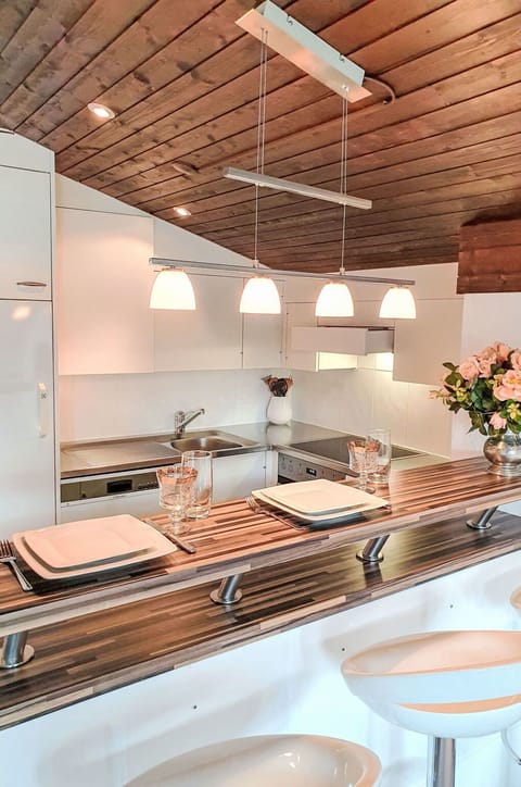 Interior Design, Countertop, Kitchen, Light Fixture, Furniture, Ceiling, Wood, Flooring, Lighting, Floor